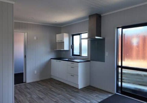 36 square metre rental cabin kitchen, viewed from living room
