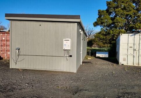 Exterior of 36 square meter rental cabin showing gas connection
